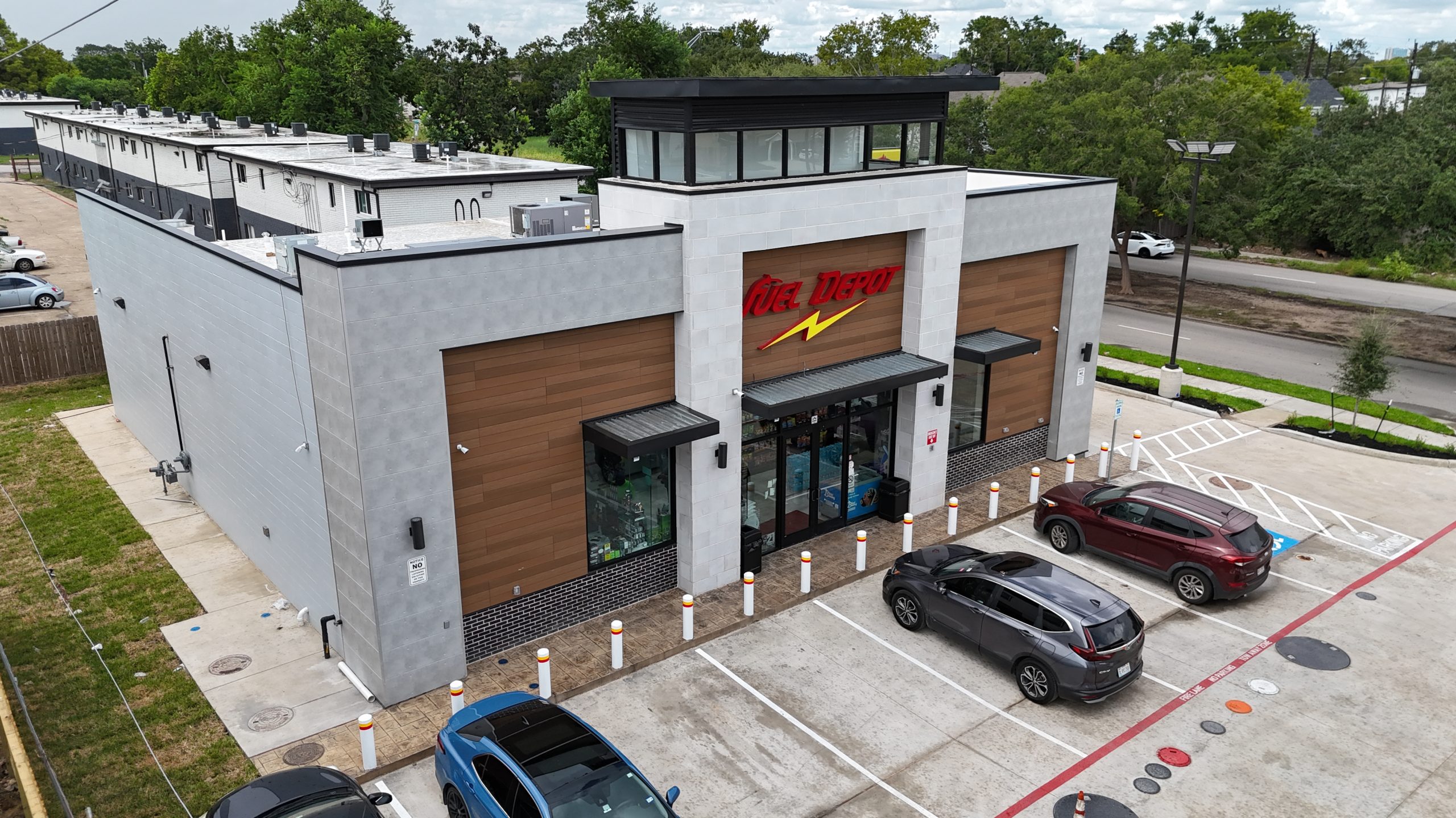 Aerial view of the Bellfort gas station and fuel canopy
